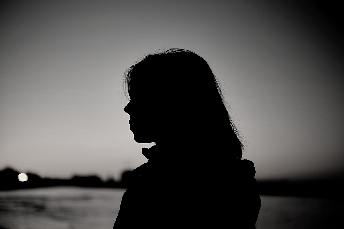 Silhouette of a Woman During Sunset